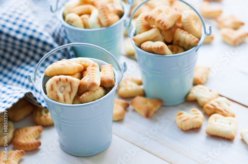 Crackers on wooden baord photo