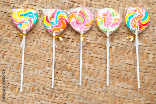 colorful lollipops on white background