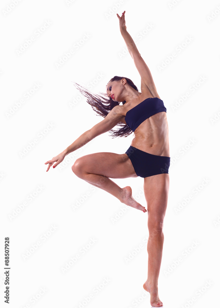 Stylish and young modern style dancer jumping Stylish and young modern style dancer jumping