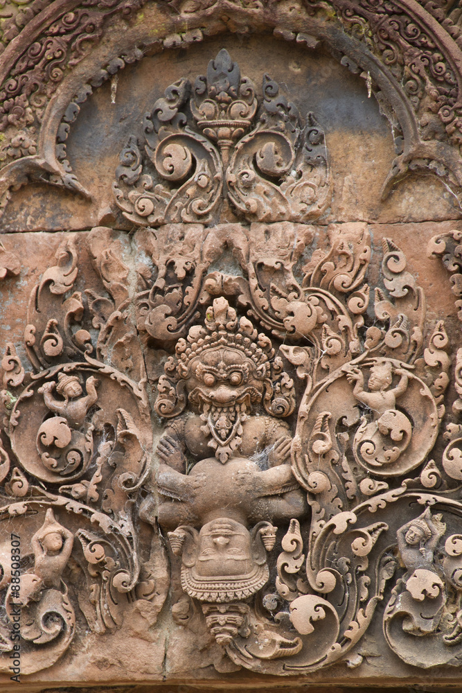 Detail of stone carving decoration in Banteay Srei .near Seim Reap, Cambodia