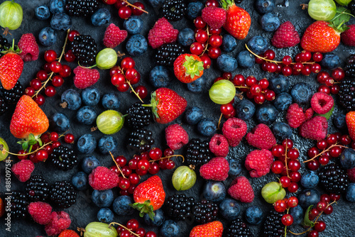 Fototapeta Naklejka Na Ścianę i Meble -  Mixed fresh ripe berries background