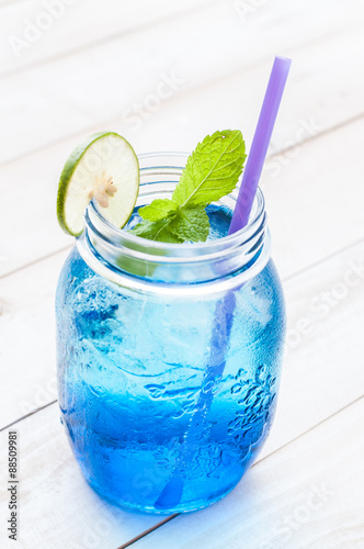cocktail glass with the Blue Hawaii  mason jar