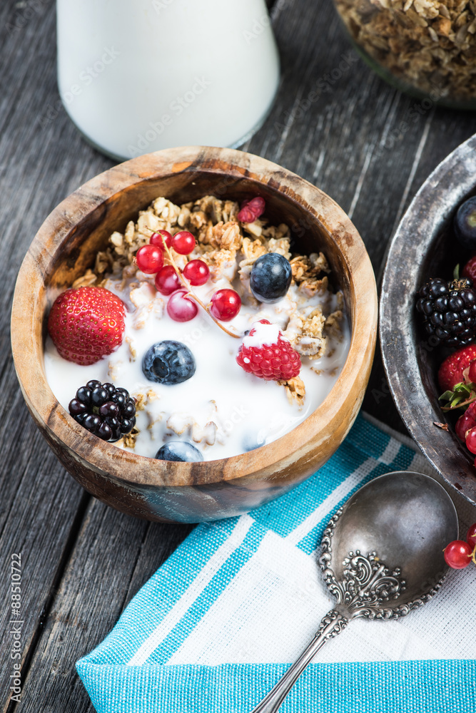 Fresh summer breakfast, granola and berries Fresh summer breakfast, granola and berries