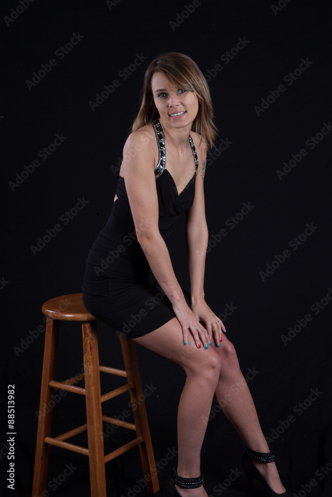 Fototapeta premium Happy woman sitting down