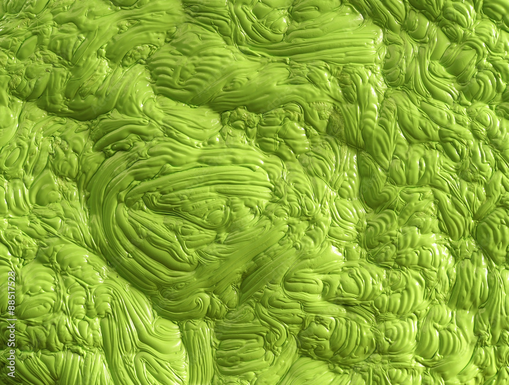 Bright green polymer mass with a gloss flat, dough or mud like structure in green shades Bright green polymer mass with a gloss flat, dough or mud like structure in green shades
