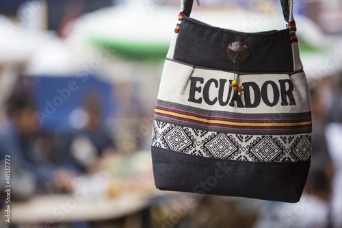 Wool bag hanging at the Andean market of Otavalo, Ecuaor photo