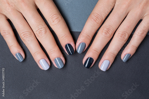 Female hands with a stylish neutral manicure