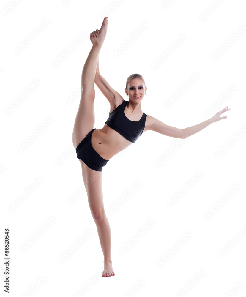 Smiling blonde posing doing vertical split Smiling blonde posing doing vertical split