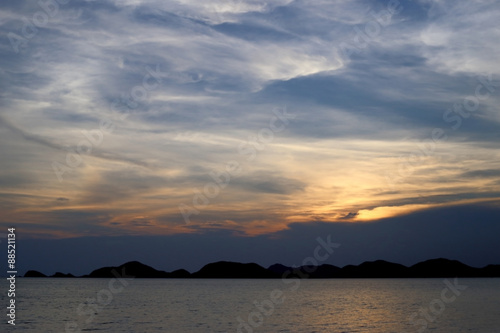 Blurred scene of sea water at sunset background. © enrouteksm