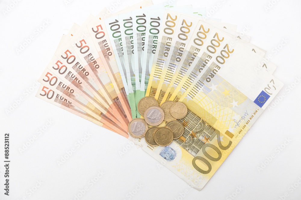 euro banknote and coin on white background euro banknote and coin on white background