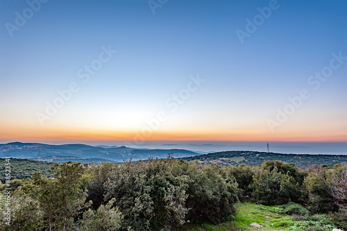 Twilight in Ajloun, Jordan, about 76 km north west of Amman, with Israel visible.