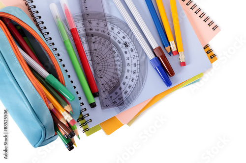 Student school supplies equipment pencil case books writing notebook pens pencils pile heap isolated on white background photo photo