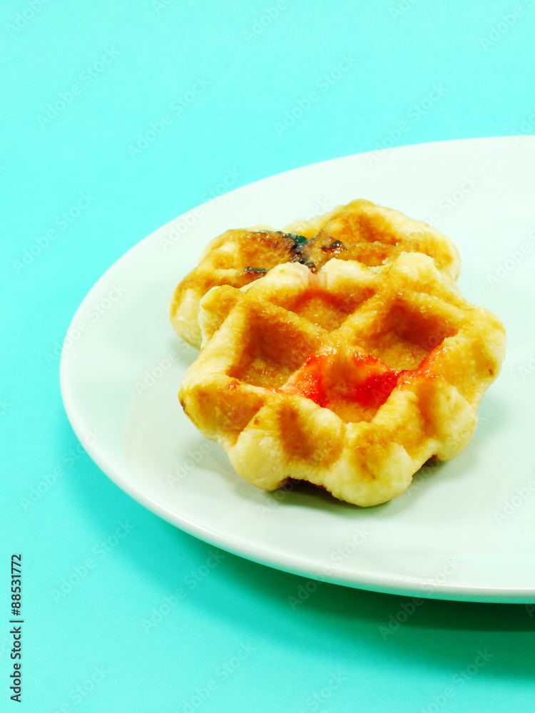 homemade sweet waffles with chocolate and strawberry sauce homemade sweet waffles with chocolate and strawberry sauce