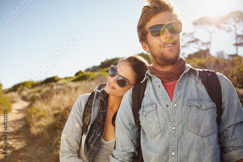 Young hiking couple enjoying nature