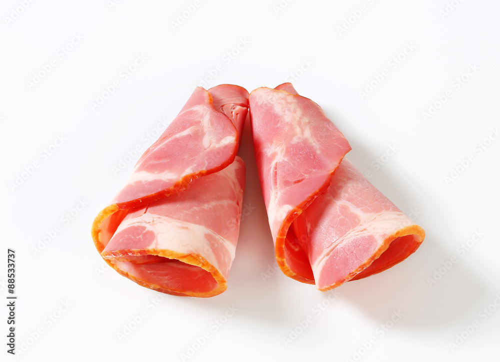 Slices of smoked pork - rolled up