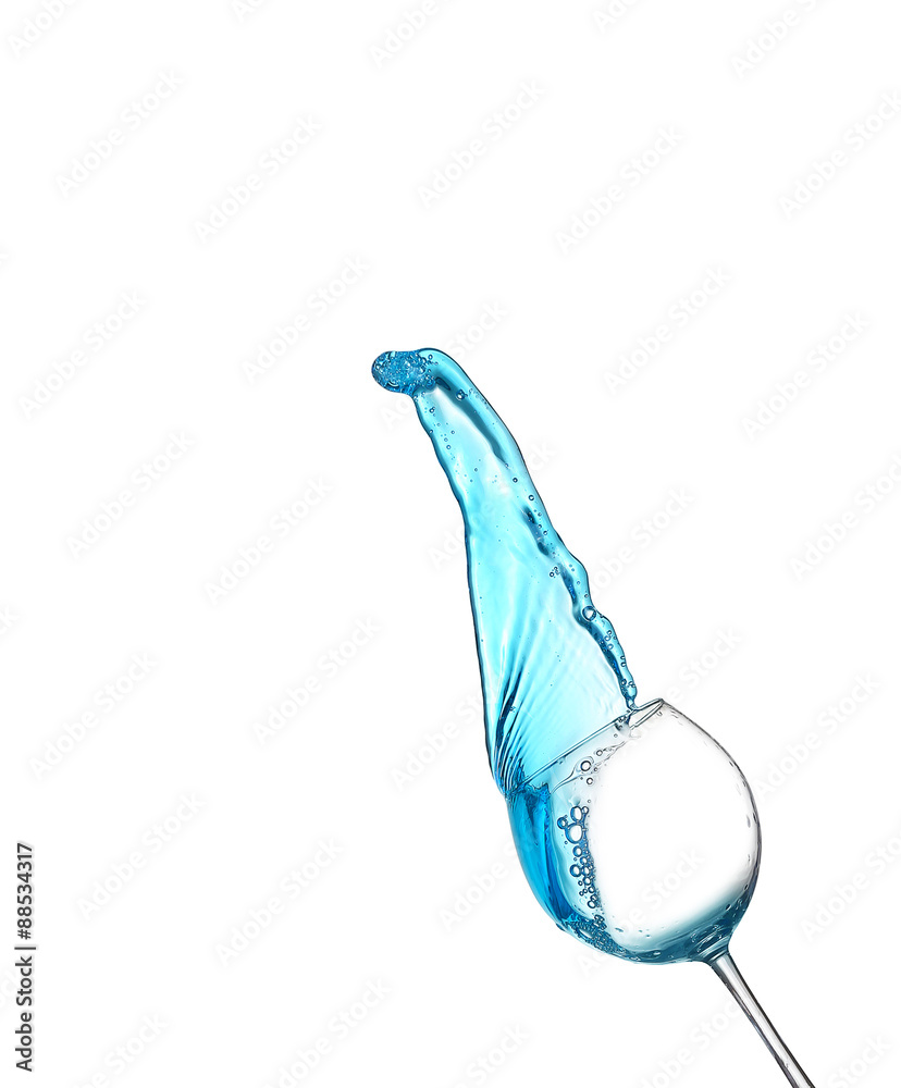 Blue alcoholic cocktail on white isolate splash Blue alcoholic cocktail on white isolate splash