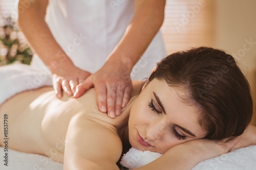 Young woman getting back massage