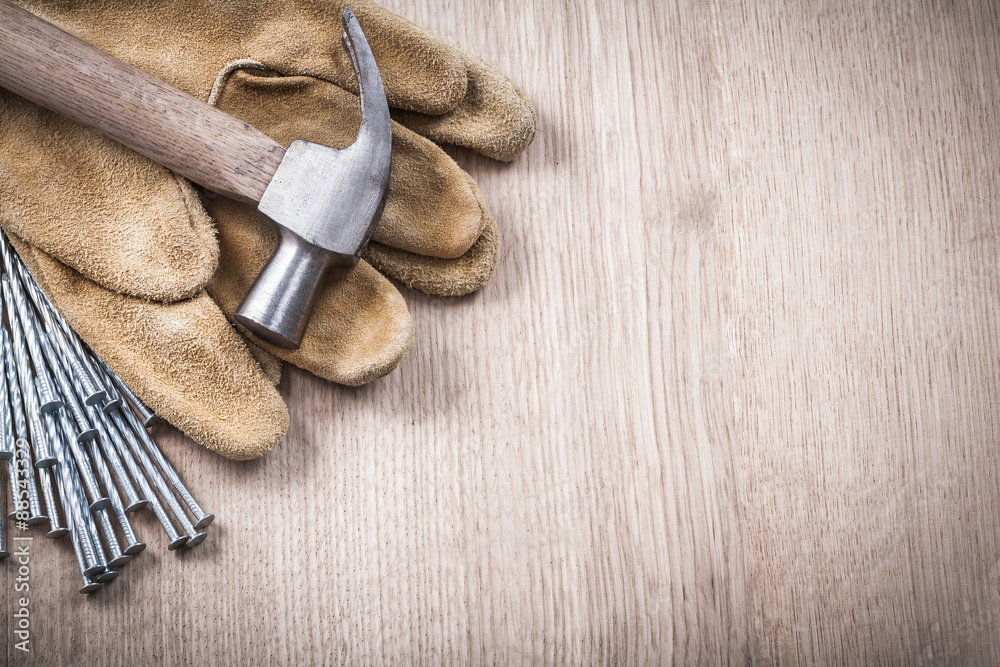Copy space of claw hammer leather safety gloves and steel long n Copy space of claw hammer leather safety gloves and steel long n