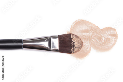 Liquid foundation with makeup brush photo