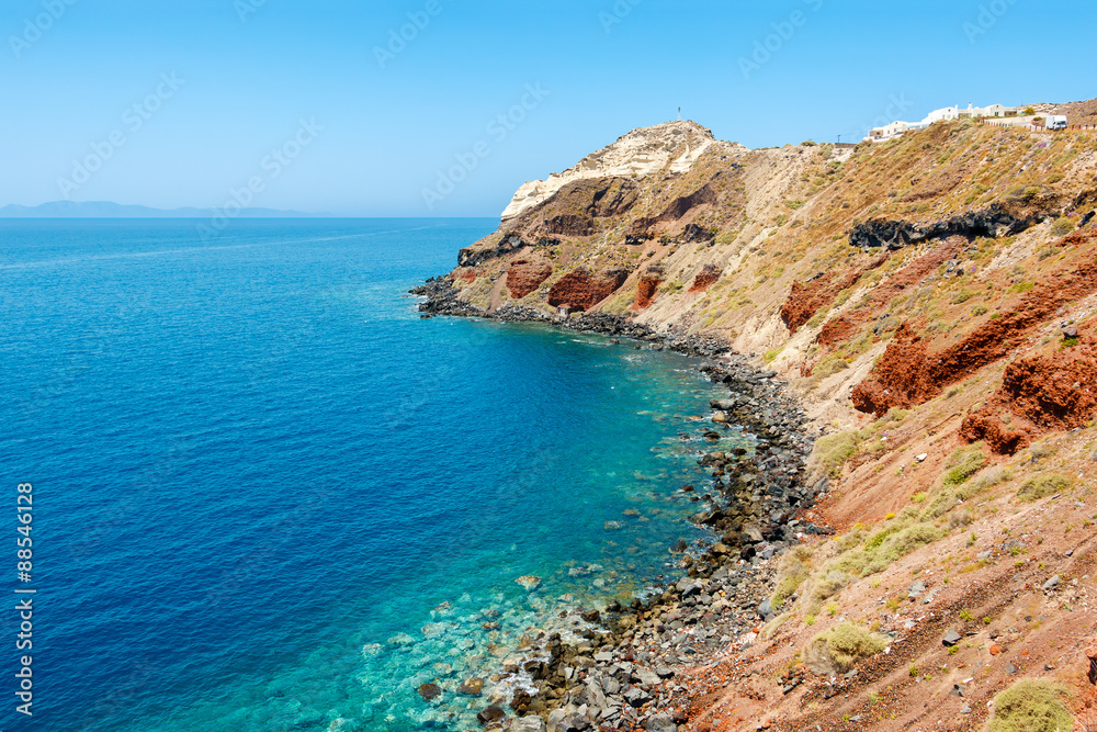 Colorful rocky shore on Santorini island, Greece