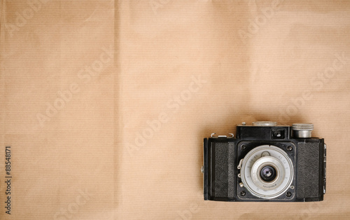 retro camera on paper background