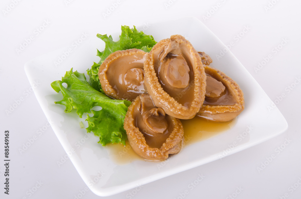 Fototapeta premium Abalones. Chinese cuisine abalone on background.