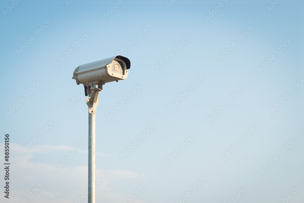 Security camera on blue sky background Security camera on blue sky background