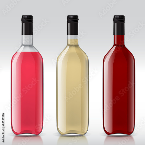 Set of transparent bottles for different wines