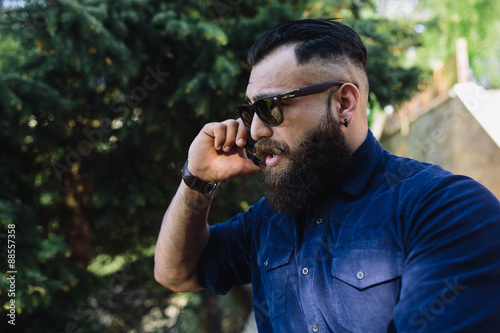 bearded speaks by phone