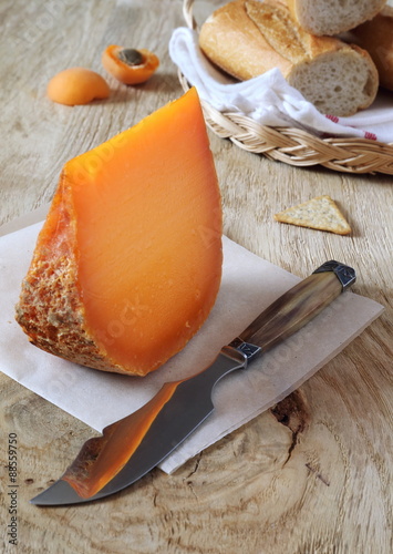 Mimolette cheese and baguette photo