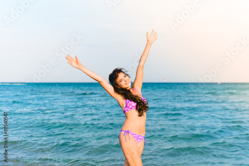 Beautiful girl smiling on the sea