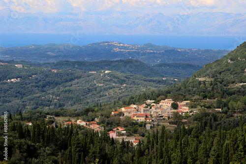 View of the village in a mountain valley. Mountain view and sea view. Ionian sea and Paleokastritsa © Agnes