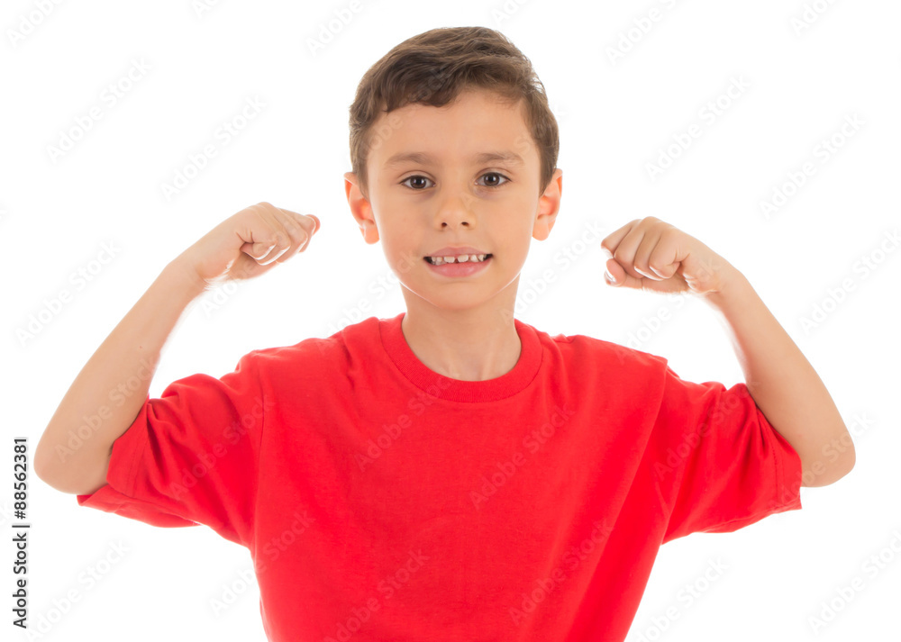 Strong young boy showing his biceps muscles isolated on white background Strong young boy showing his biceps muscles isolated on white background