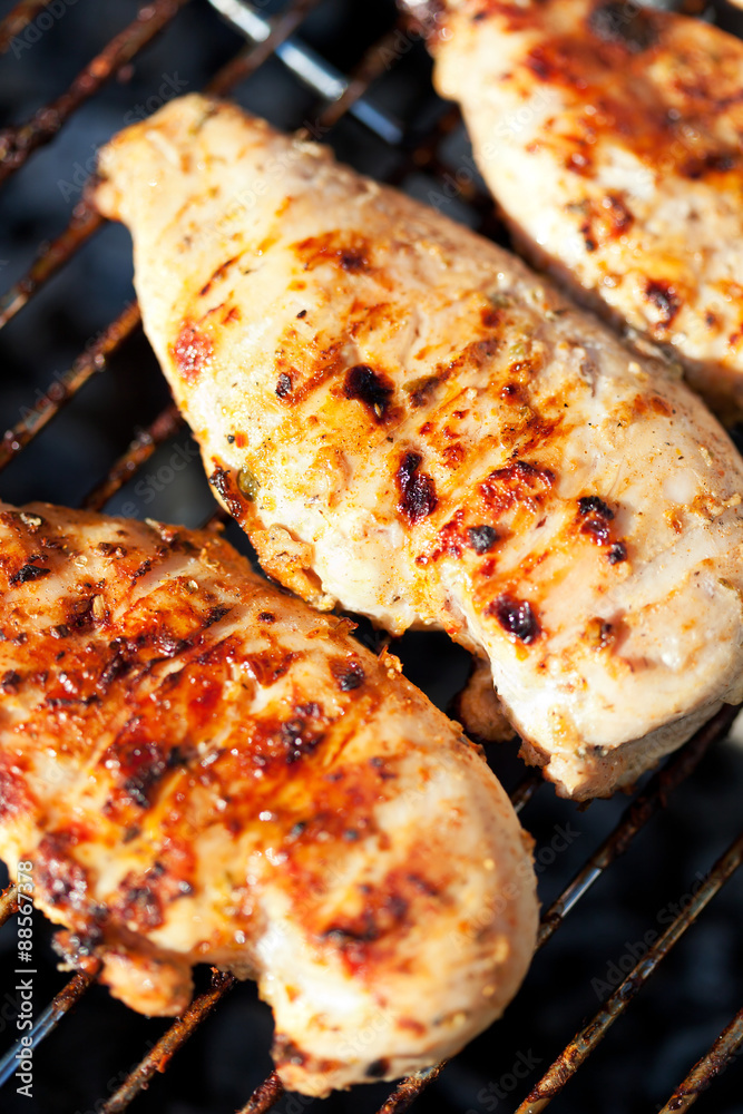 Grilled chicken breast on barbeque Grilled chicken breast on barbeque