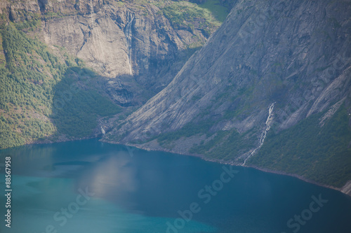 Beautiful norwegian vibrant summer landscape with fjord, mountain and lake, lake Ringedalsvatnet on the way to famous Trolltunga, Skjegeddal rock, near Odda, Hordaland, Norway. 