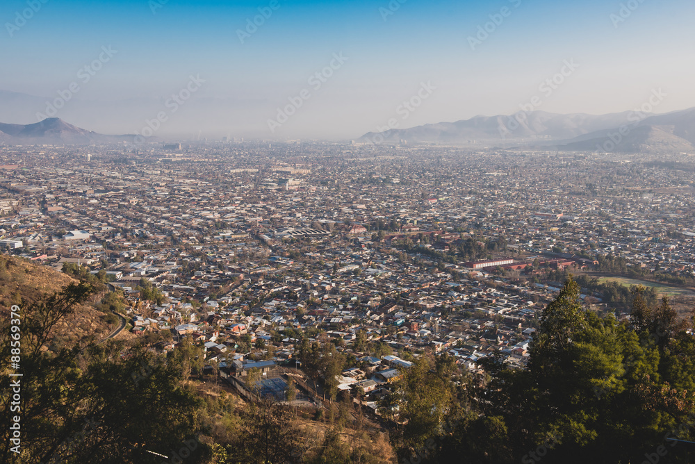 Cityscape of Santiago de Chile on a foggy day.