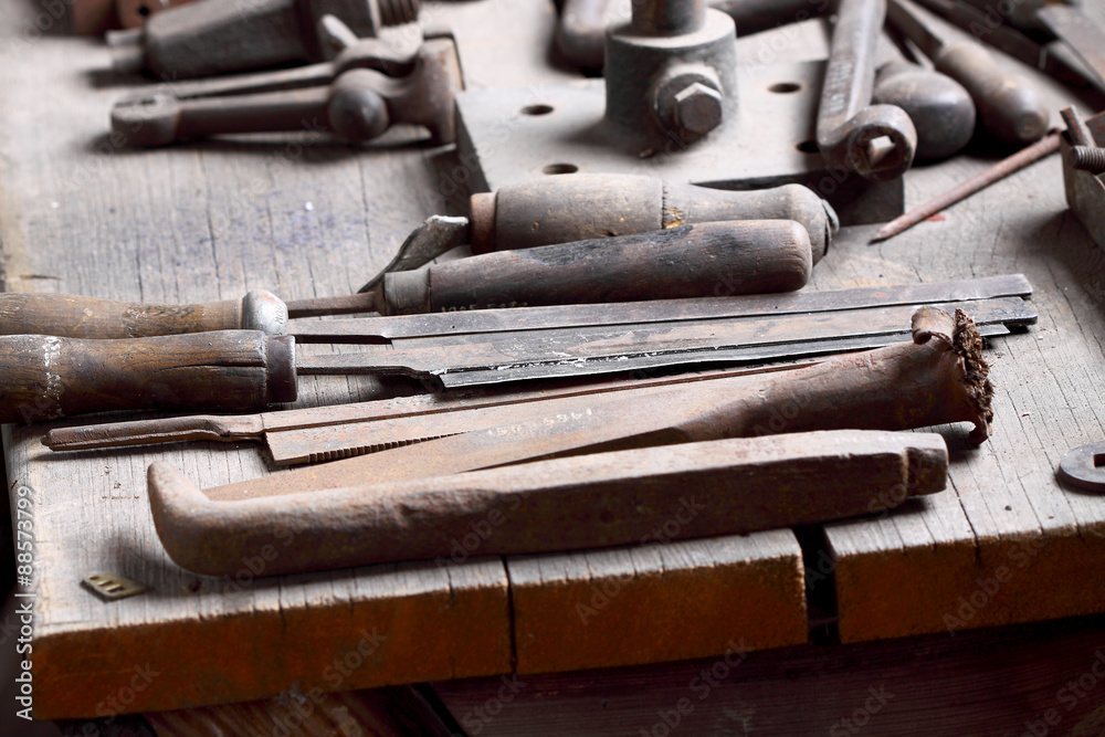 Tools workbench old.
Old tools on a workbench in a workshop. Tools workbench old.
Old tools on a workbench in a workshop.