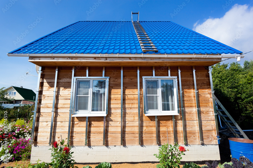 Building house, installation of galvanized crate Building house, installation of galvanized crate