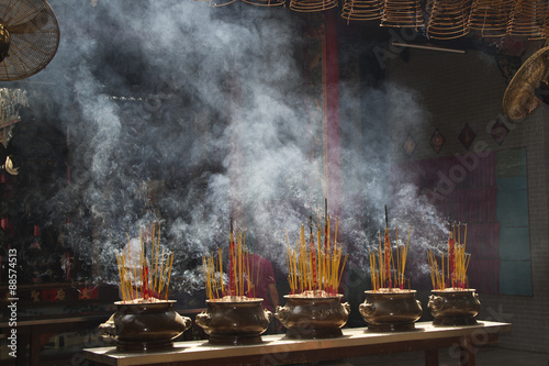 Incense smake fills the interior of a C inese temple.Chinatown,Ho Chi Mihn City (Saigon),Vietnam..