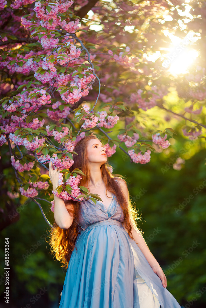 Young pregnant woman relaxing and enjoying life in nature Young pregnant woman relaxing and enjoying life in nature