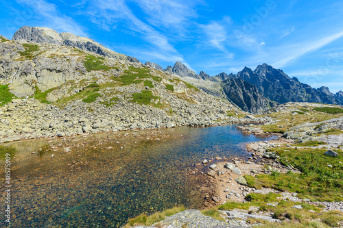 View of beautiful alpine lake in summer landscape of Starolesna valley, High Tatra Mountains, Slovakia © pkazmierczak