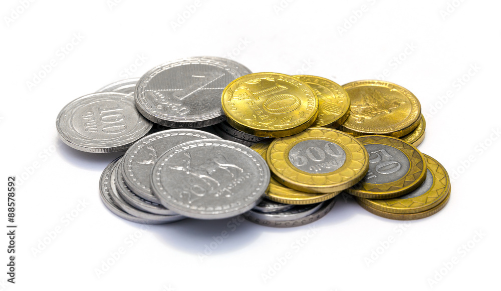 Stacks of Russian, Georgian and Armenian coins on a white background Stacks of Russian, Georgian and Armenian coins on a white background