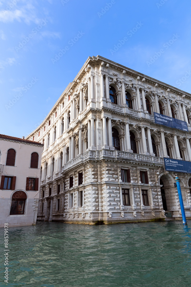 Fototapeta premium Classic view of Venice with canal and old buildings. Venice is one of the most popular tourist destinations in the world