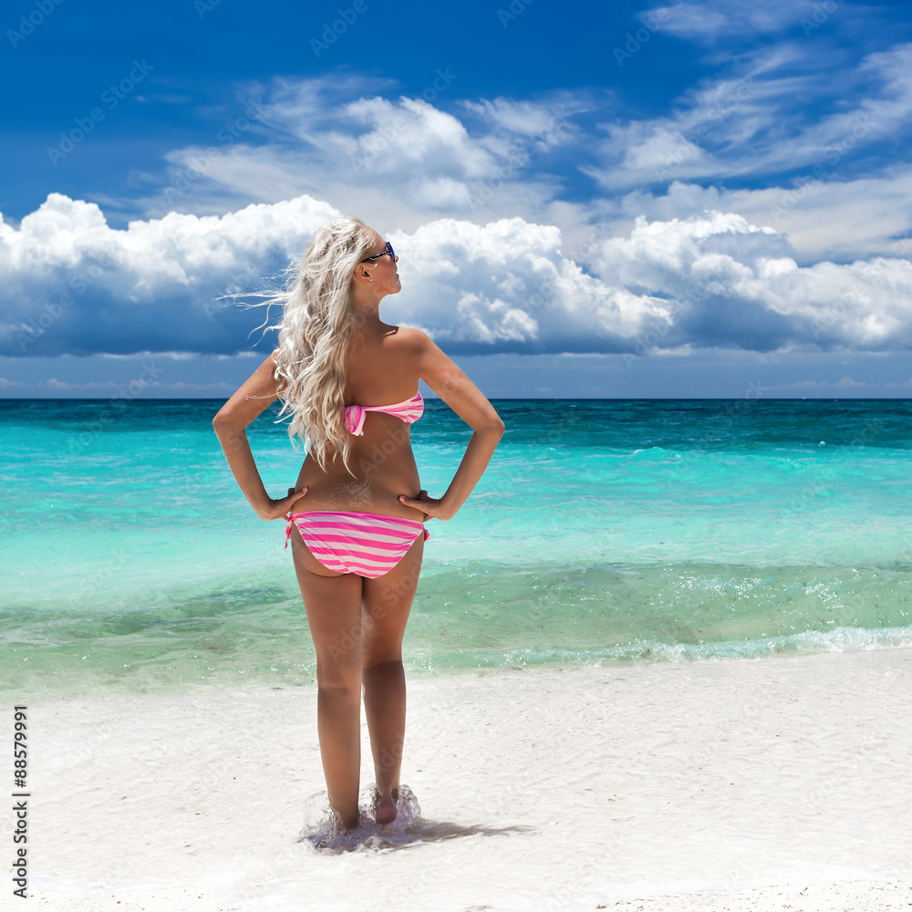 Woman in bikini on tropical beach, Philippines Woman in bikini on tropical beach, Philippines