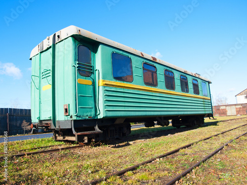 Green narrow-gauge railway wagon