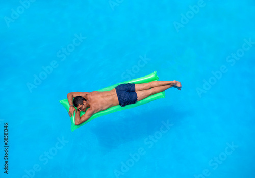 man relaxing on the air bed