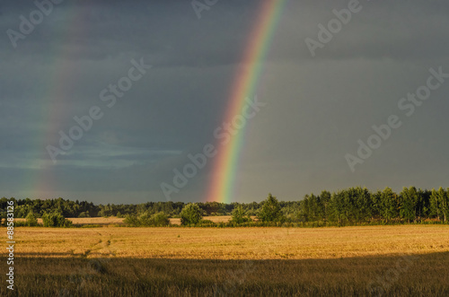 Landscape with rainbow. Russian nature