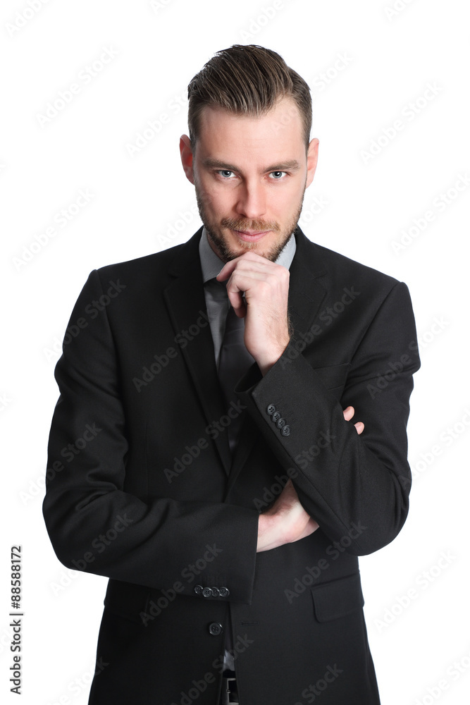Attractive businessman in his 20s wearing a black suit with an black tie Attractive businessman in his 20s wearing a black suit with an black tie