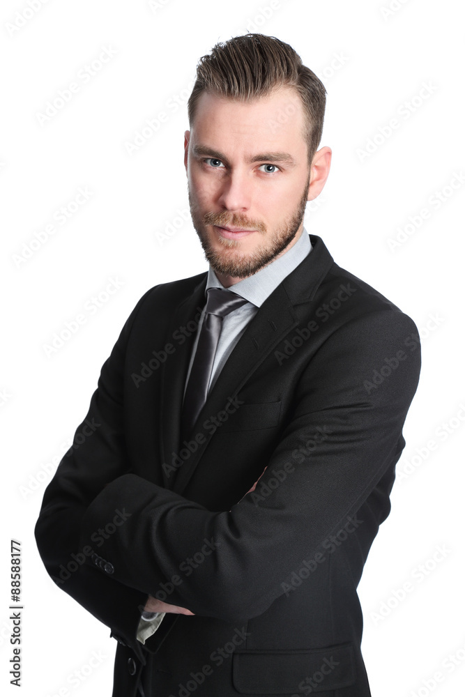 Attractive businessman in his 20s wearing a black suit with an black tie Attractive businessman in his 20s wearing a black suit with an black tie