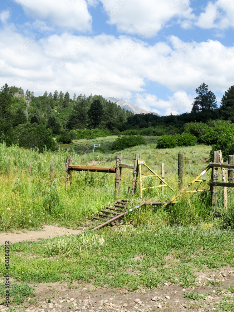 Ramped cattle guard entrance to Dry Fork mountain biking trail